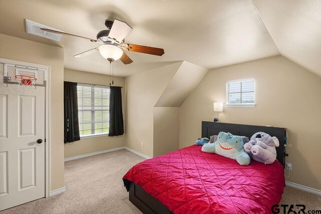 803 Marquette Ln, Tyler, TX 75703 - carpeted bedroom featuring lofted ceiling, baseboards, and a ceiling fan