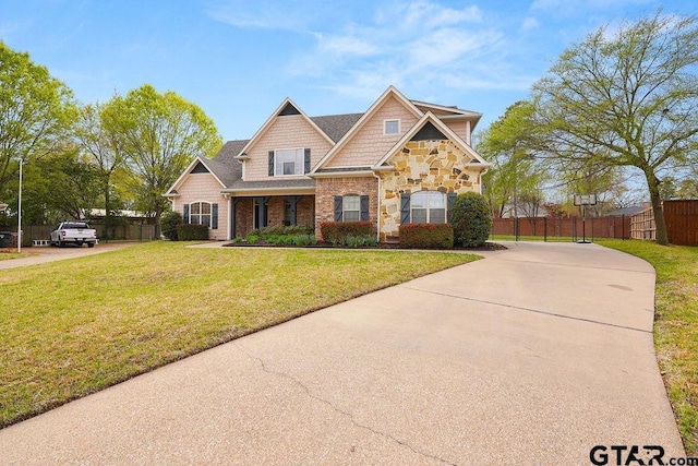 803 Marquette Ln, Tyler, TX 75703 - craftsman inspired home featuring concrete driveway and stone siding