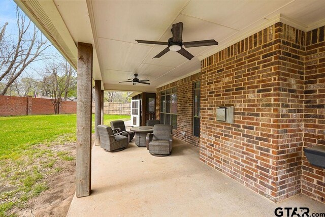 803 Marquette Ln, Tyler, TX 75703 - view of patio with ceiling fan and an outdoor living space