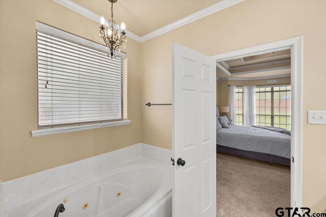 803 Marquette Ln, Tyler, TX 75703 - ensuite bathroom featuring crown molding, a chandelier, and a jetted tub
