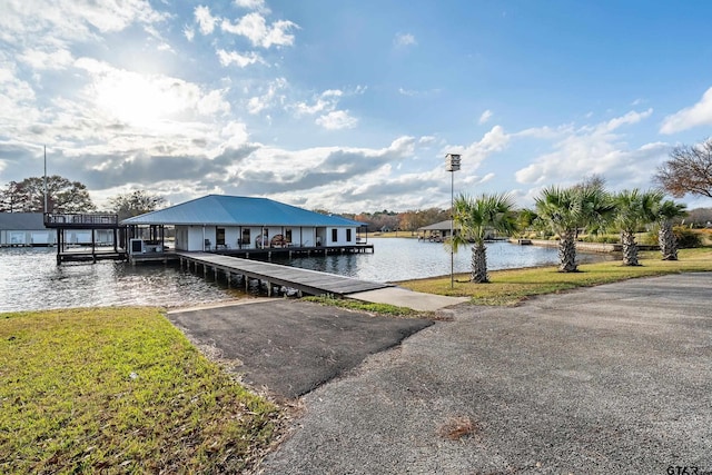 17726 Southpoint Rd, Whitehouse, TX 75791 - dock featuring a boat ramp, a water view, and a lawn
