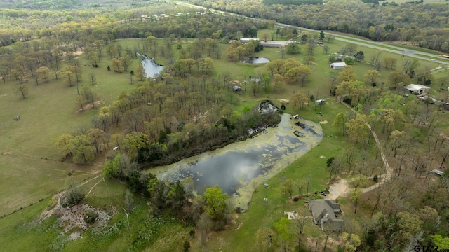 birds eye view of property with a water view and a rural view