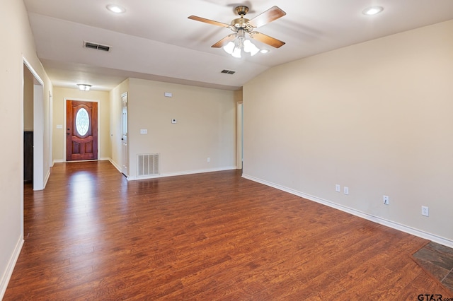 entrance foyer with dark hardwood / wood-style flooring, ceiling fan, and vaulted ceiling