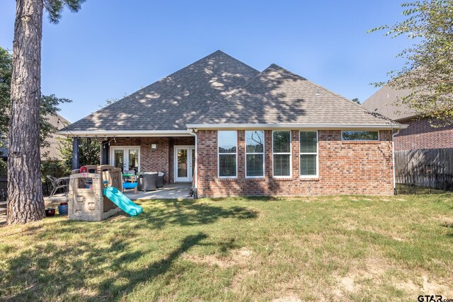 759 Hampton Hill Hill, Tyler, TX 75703 - back of house featuring brick siding, a shingled roof, french doors, and a patio