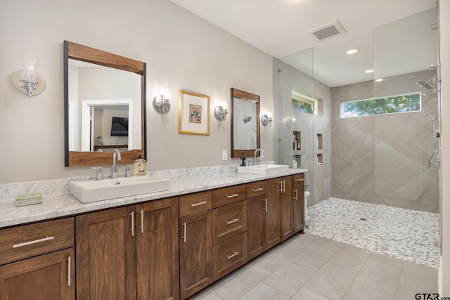 759 Hampton Hill Hill, Tyler, TX 75703 - bathroom featuring double vanity, a walk in shower, and tile patterned floors
