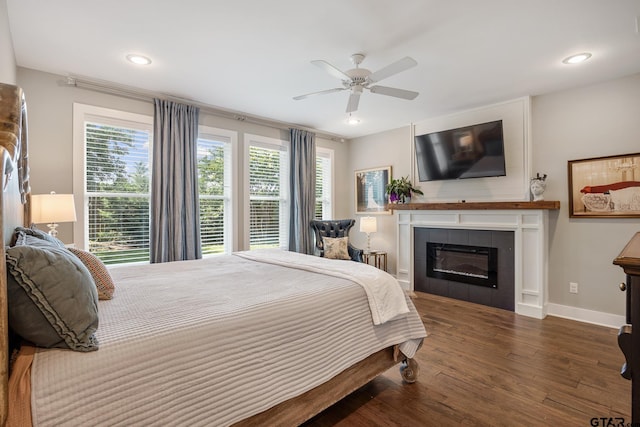 759 Hampton Hill Hill, Tyler, TX 75703 - bedroom featuring wood finished floors, multiple windows, a fireplace, recessed lighting, and ceiling fan