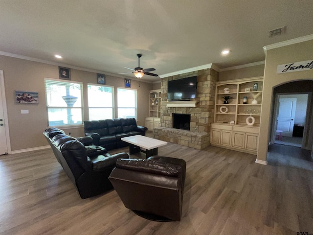 214 Rosebrook Cir, Whitehouse, TX 75791 - living room with ornamental molding, a fireplace, wood finished floors, ceiling fan, and recessed lighting