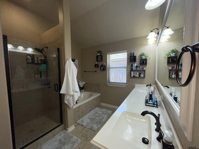 214 Rosebrook Cir, Whitehouse, TX 75791 - bathroom with double vanity, a bath, a shower stall, tile patterned flooring, and lofted ceiling