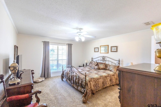 2505 W Gay Ave, Gladewater, TX 75647 - bedroom featuring crown molding, light colored carpet, a textured ceiling, a ceiling fan, and baseboards