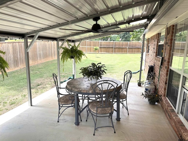 2505 W Gay Ave, Gladewater, TX 75647 - sunroom featuring a ceiling fan and outdoor dining space