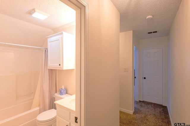2505 W Gay Ave, Gladewater, TX 75647 - full bath featuring toilet, vanity, a textured ceiling, shower / bath combo with shower curtain, and baseboards