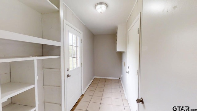 interior space with light tile patterned floors