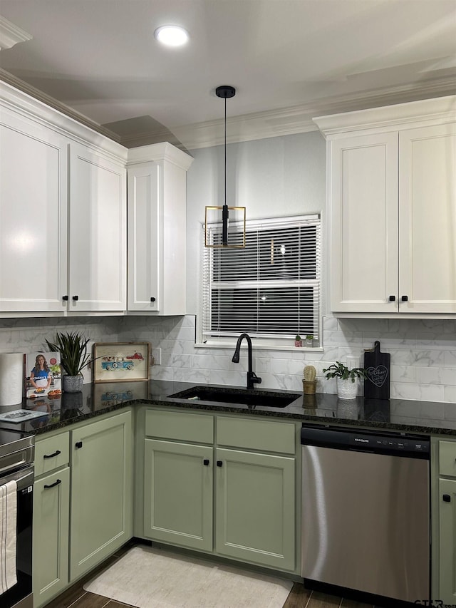 kitchen with white cabinets, sink, stainless steel dishwasher, crown molding, and pendant lighting