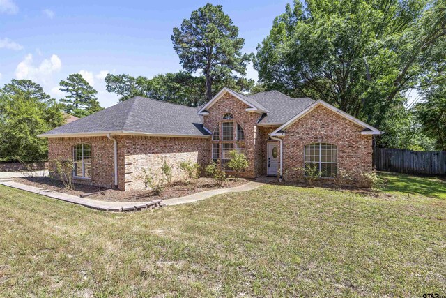 1737 Bearwood Ln, Tyler, TX 75703 - view of front of property featuring brick siding and roof with shingles