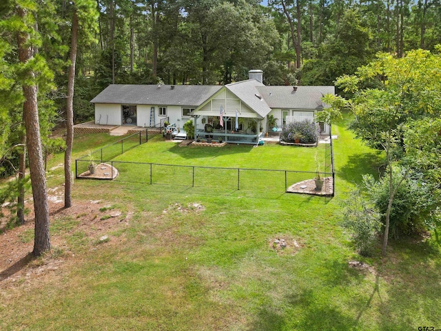 exterior space with a lawn and a patio