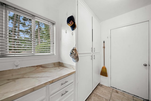 bathroom with tile patterned floors