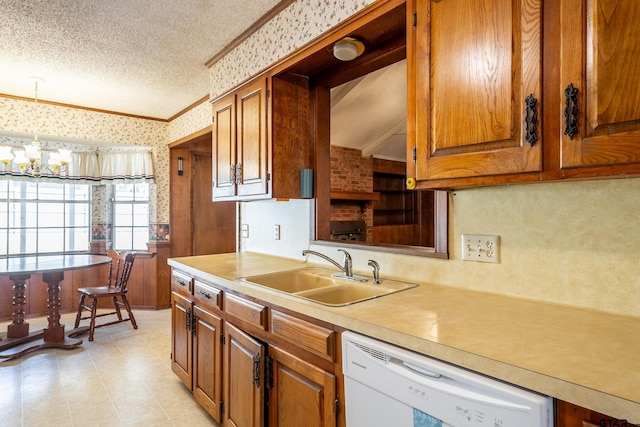 kitchen with brown cabinets, a sink, a textured ceiling, dishwasher, and wallpapered walls