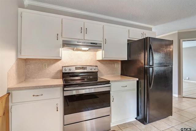 kitchen featuring black refrigerator, crown molding, electric stove, white cabinetry, and light tile patterned flooring