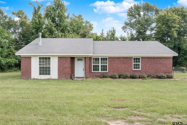 ranch-style house with a front yard