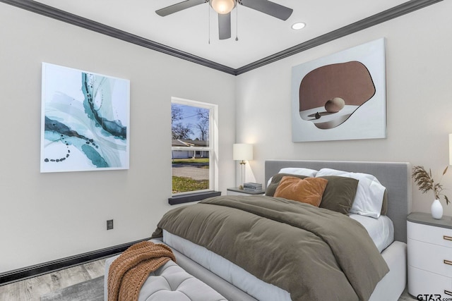 bedroom featuring wood finished floors, a ceiling fan, and ornamental molding