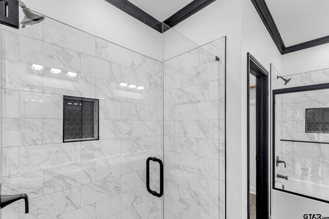 bathroom with a tile shower and crown molding