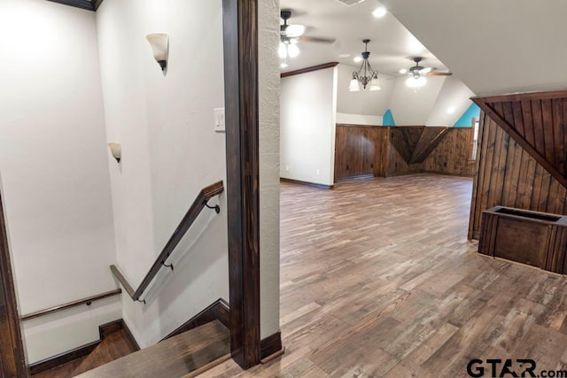 bonus room featuring hardwood / wood-style floors and vaulted ceiling