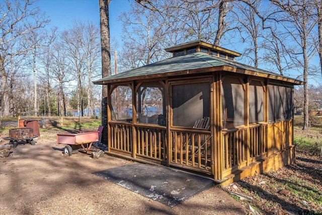 exterior space featuring a sunroom