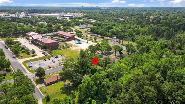 bird's eye view featuring a forest view