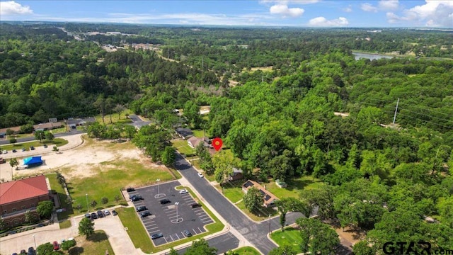 aerial view featuring a forest view