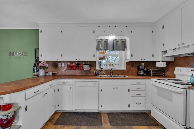 kitchen with backsplash, under cabinet range hood, white appliances, white cabinetry, and a sink