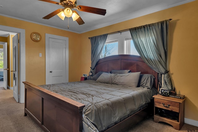 bedroom with baseboards, multiple windows, light carpet, and crown molding