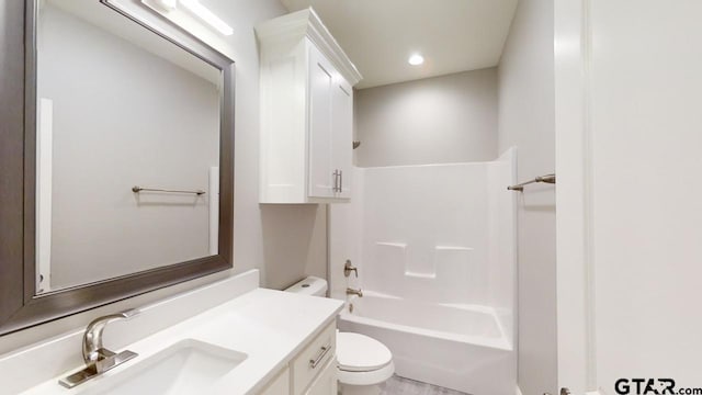 full bathroom with toilet, vanity, and bathing tub / shower combination