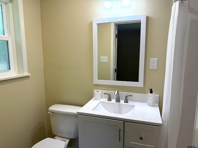 828 Adams St, Jacksonville, TX 75766 - bathroom with vanity and toilet