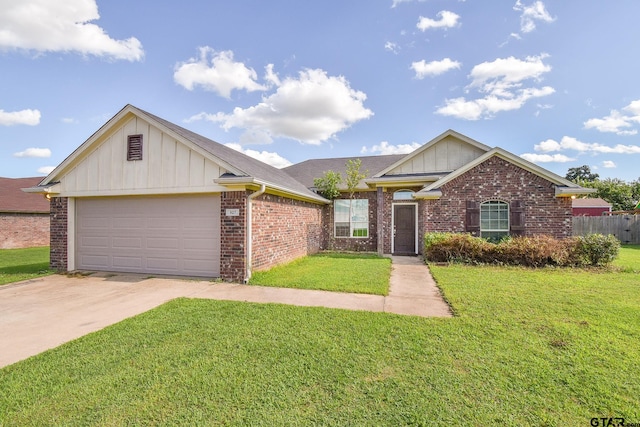 view of front of home featuring a front lawn and a garage