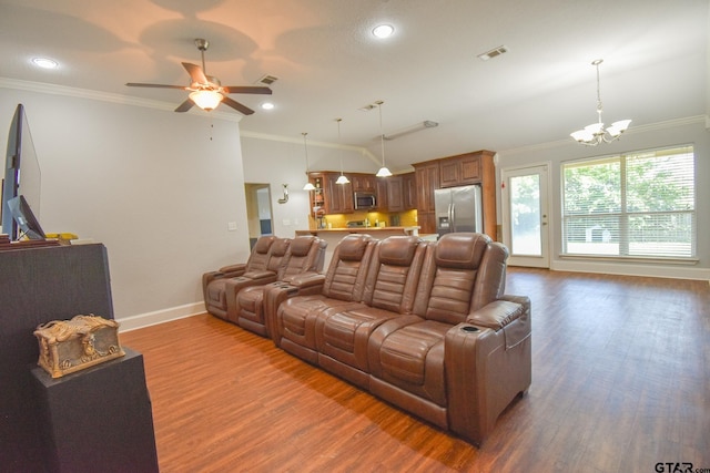 living room with ornamental molding, ceiling fan with notable chandelier, and dark hardwood / wood-style floors