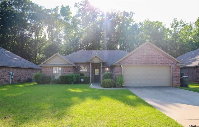 ranch-style house with a garage, a front yard, and cooling unit