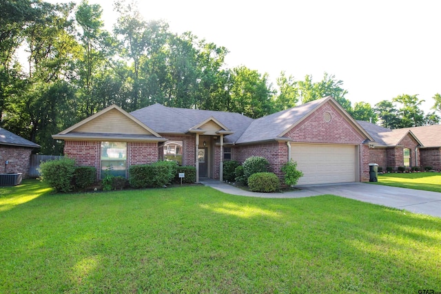 ranch-style home with central AC unit, a garage, and a front yard