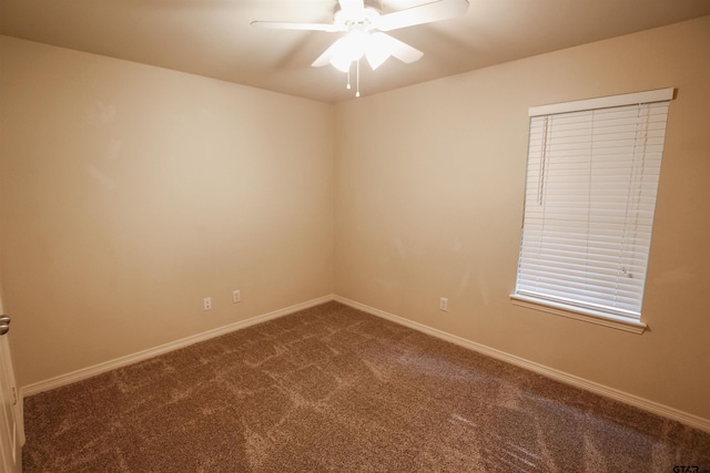 empty room with carpet and ceiling fan