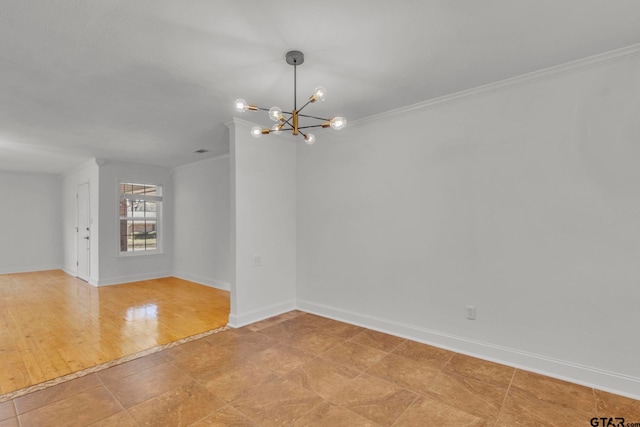 unfurnished room with crown molding and a chandelier