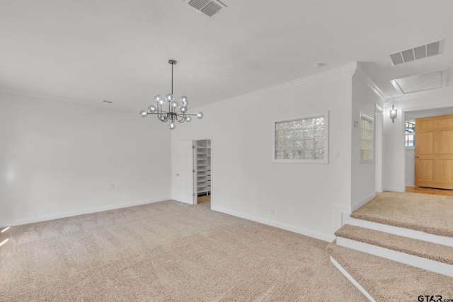 unfurnished room featuring crown molding, light colored carpet, and a notable chandelier