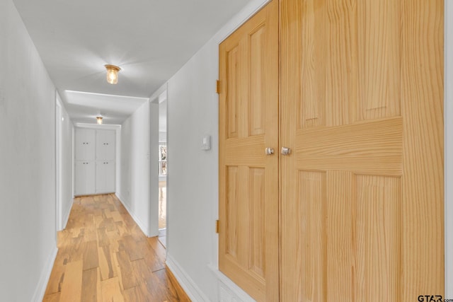 hall featuring light hardwood / wood-style flooring