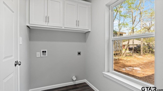 washroom with dark wood-style floors, baseboards, cabinet space, electric dryer hookup, and washer hookup