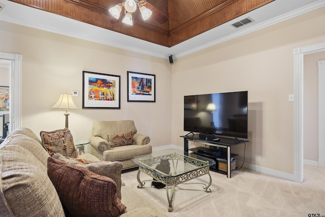 2213 Woodlands Dr, Tyler, TX 75703 - carpeted living area featuring ornamental molding, visible vents, a ceiling fan, a tray ceiling, and baseboards
