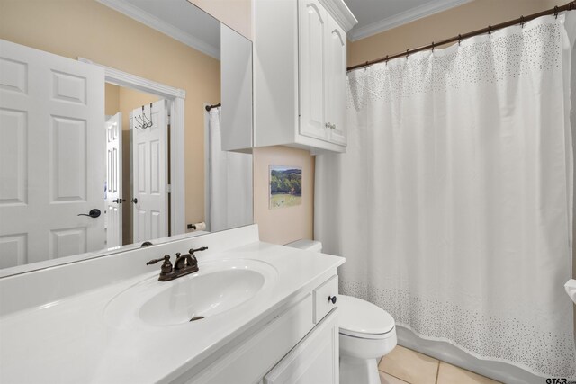 2213 Woodlands Dr, Tyler, TX 75703 - bathroom with ornamental molding, toilet, vanity, and tile patterned floors