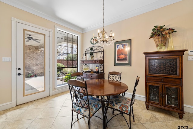 2213 Woodlands Dr, Tyler, TX 75703 - dining room featuring crown molding, light tile patterned flooring, baseboards, and an inviting chandelier