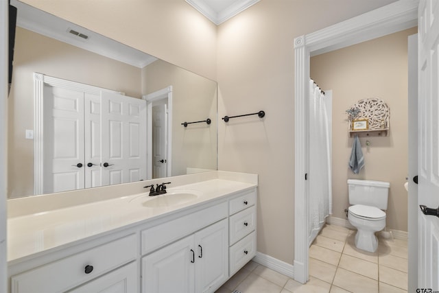 2213 Woodlands Dr, Tyler, TX 75703 - full bath with toilet, vanity, visible vents, crown molding, and tile patterned flooring