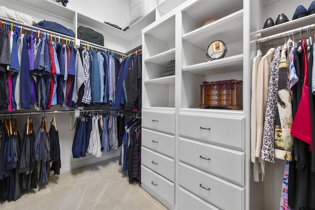 2213 Woodlands Dr, Tyler, TX 75703 - spacious closet featuring carpet floors