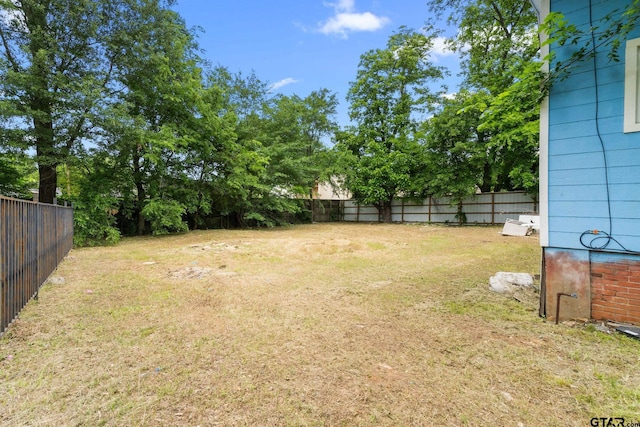 view of yard featuring a fenced backyard