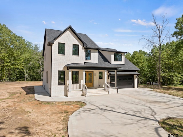 modern farmhouse featuring covered porch