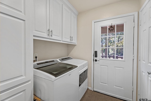 laundry area featuring cabinets and independent washer and dryer